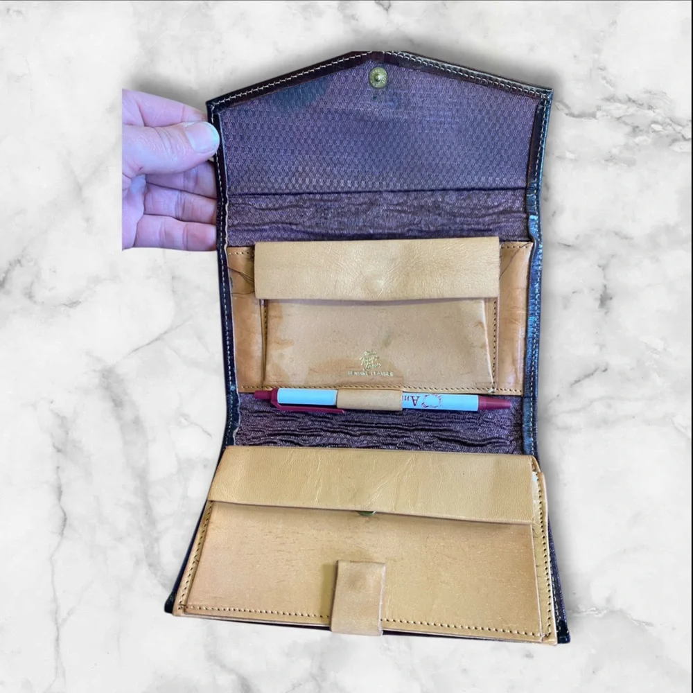 Leather billfold with check and pen spot